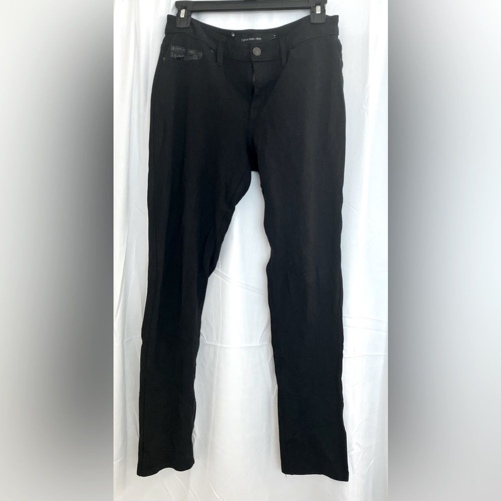 Calvin Klein Black Jeggings. Look like slacks/jeans, feel like leggings. Size 8.